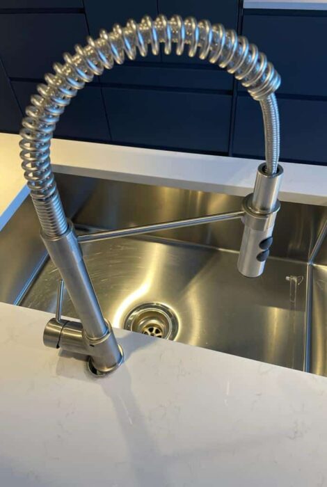 image of newly installed kitchen faucet