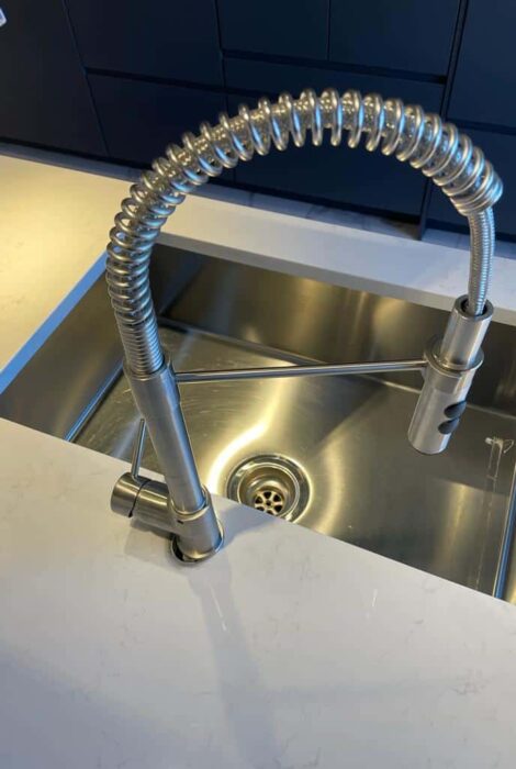 image of newly installed kitchen faucet